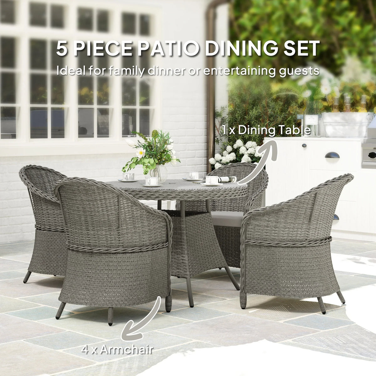 Grey woven rattan patio dining set with round table and four cushioned armchairs