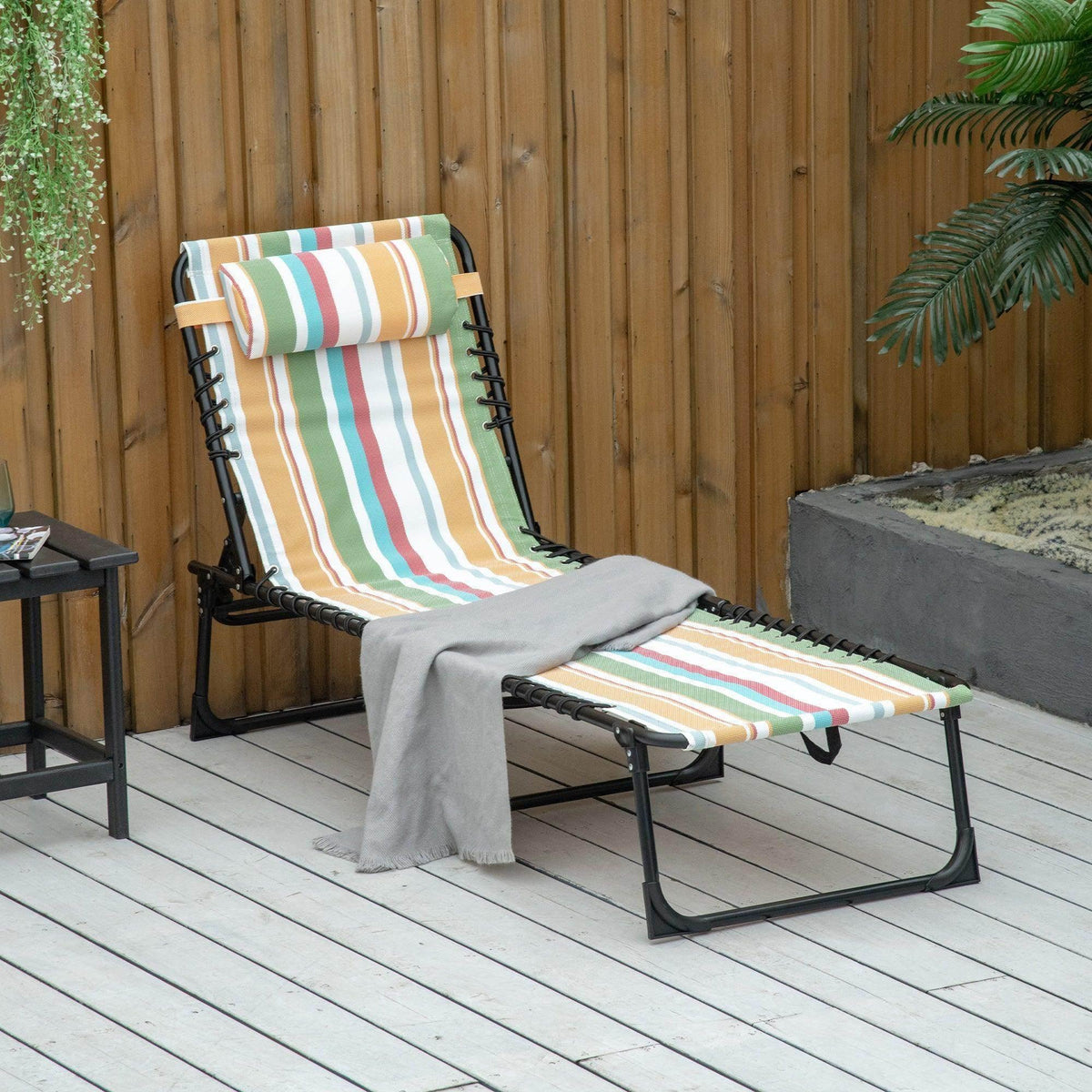 Folding chaise lounge with multicolor striped fabric on black frame, 4 positions
