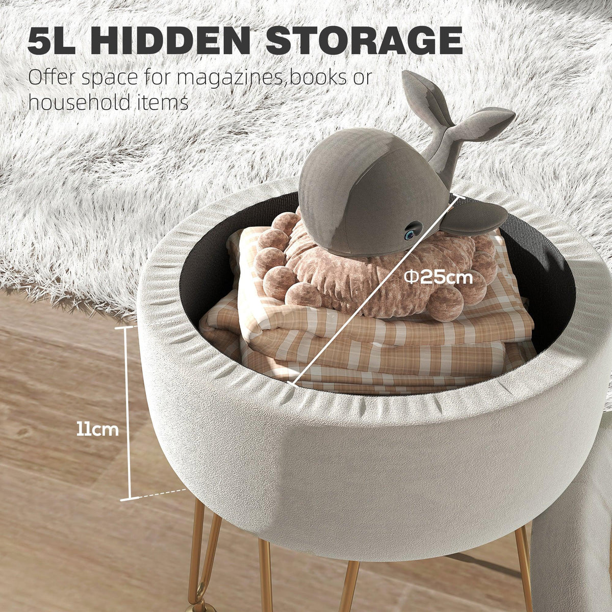 Cream round storage ottoman with cushioned seat and dark interior, gold legs