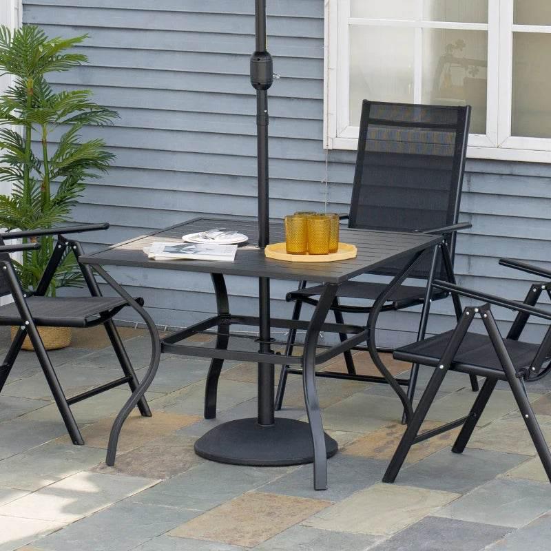 Black metal garden dining table with slatted top and central parasol hole