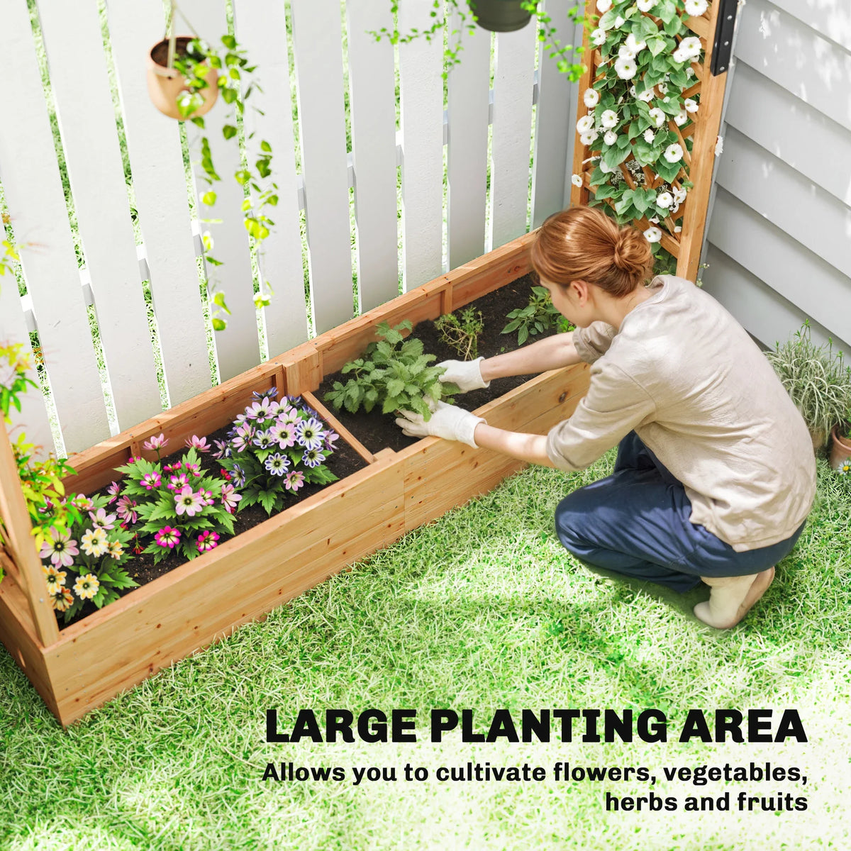 Wood raised planter box filled with flowers and greenery, supported by trellis frame