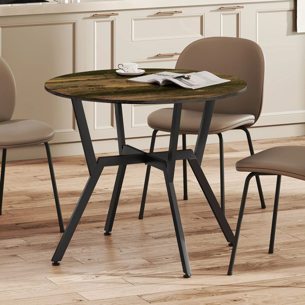 Round dining table with rustic brown top and black steel legs in a dining room