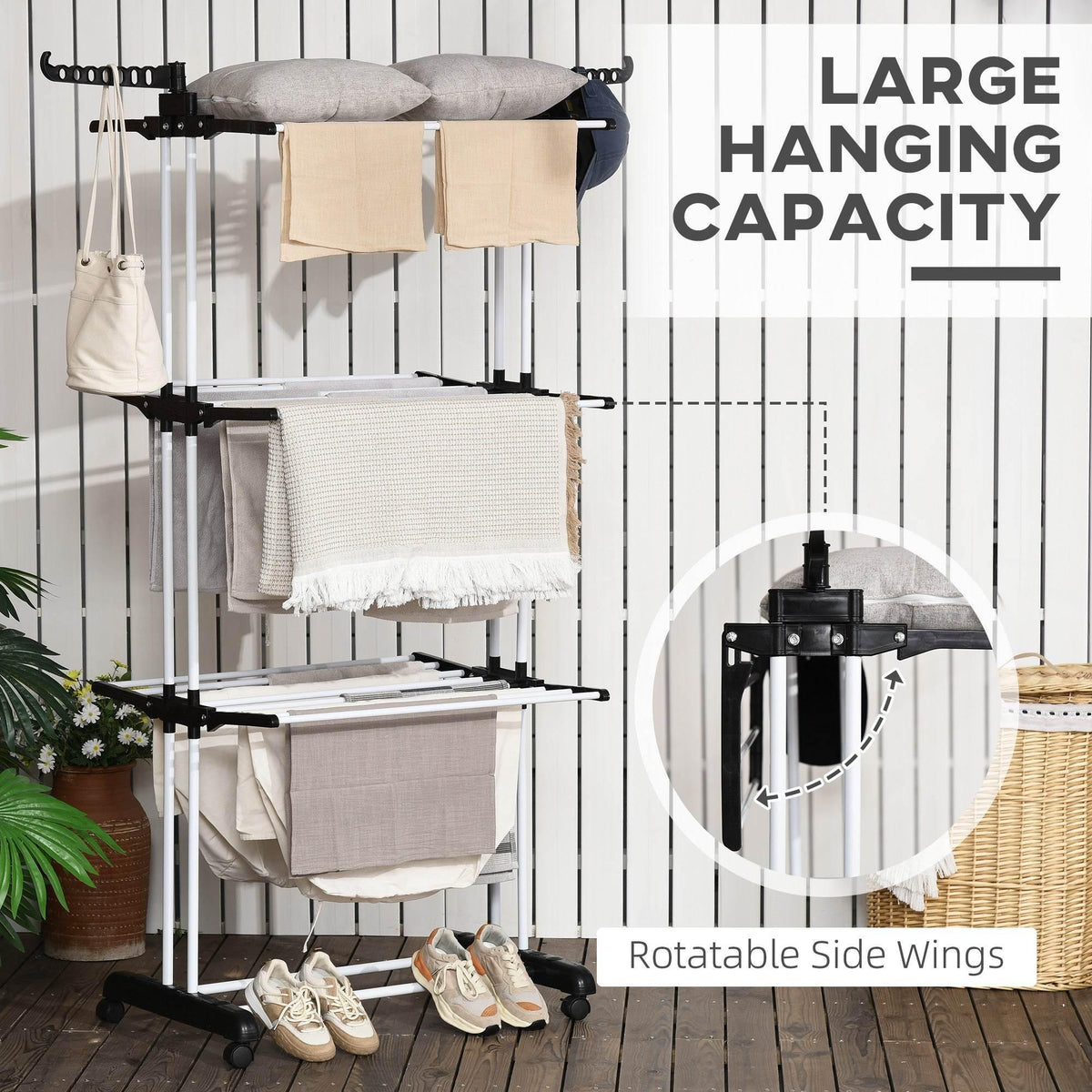 Black 4-tier laundry drying rack with rotating side wings for hanging items