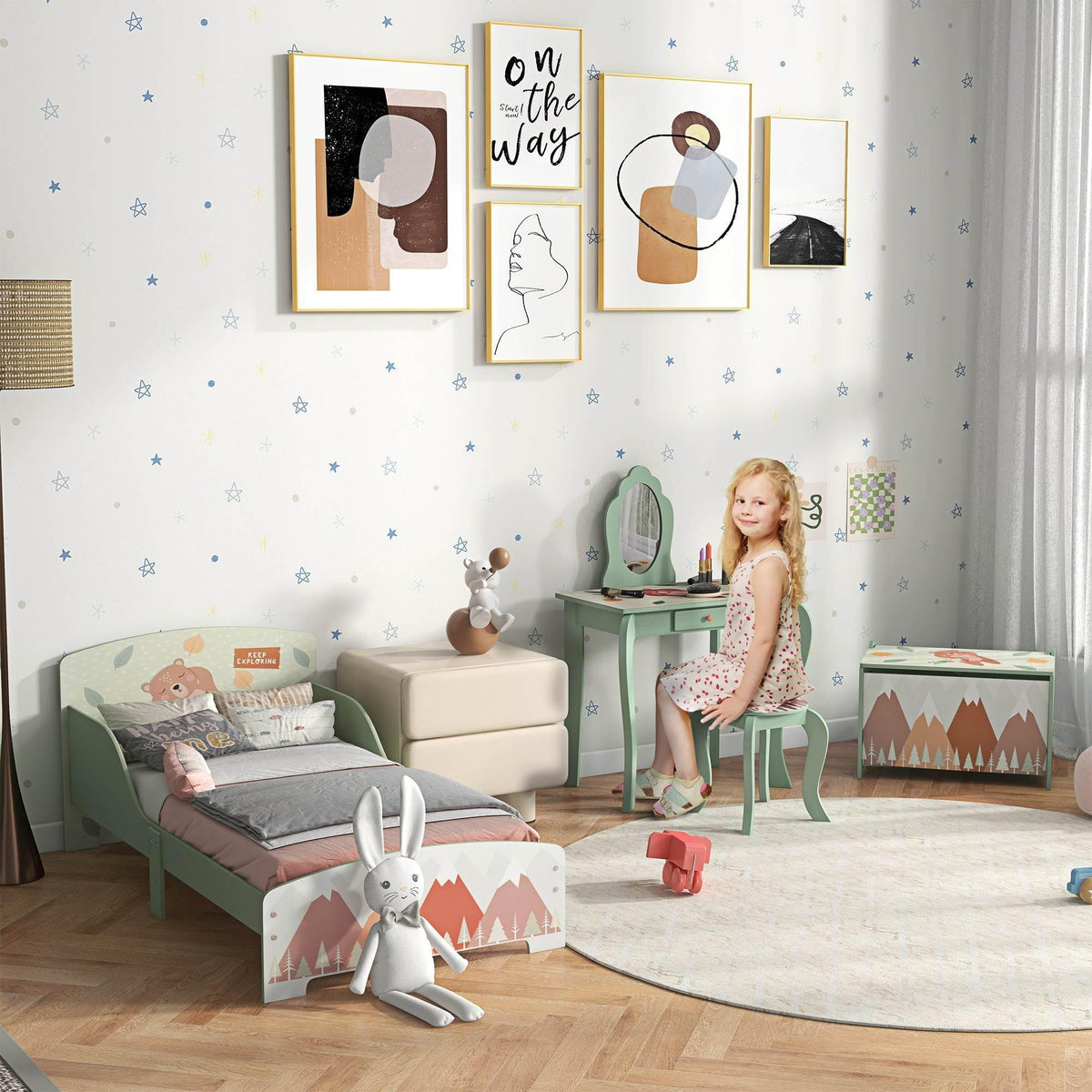Kids bedroom furniture set with green bed, vanity, toy chest, and stool