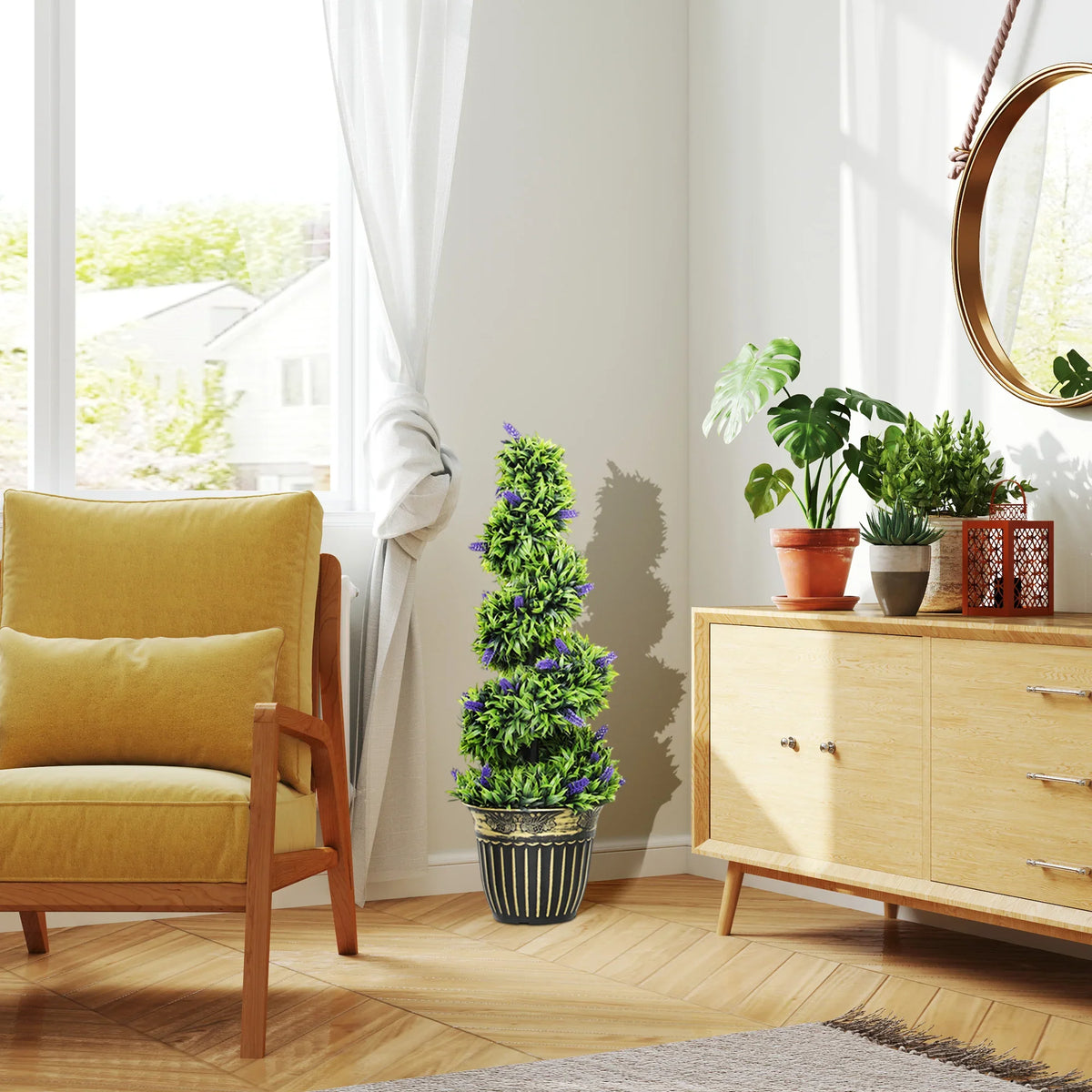 Artificial lavender tree with purple blooms in black-and-gold weighted cement pot by a sofa