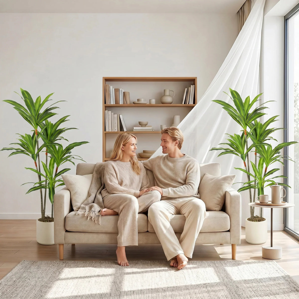 Artificial dracaena tree in white pot near sofa, tall green PEVA leaves indoor decor