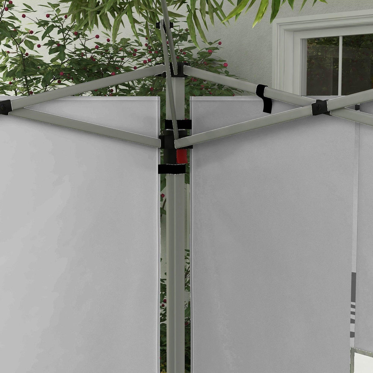 Close-up of grey side panel corner with black attachment strap and frame posts