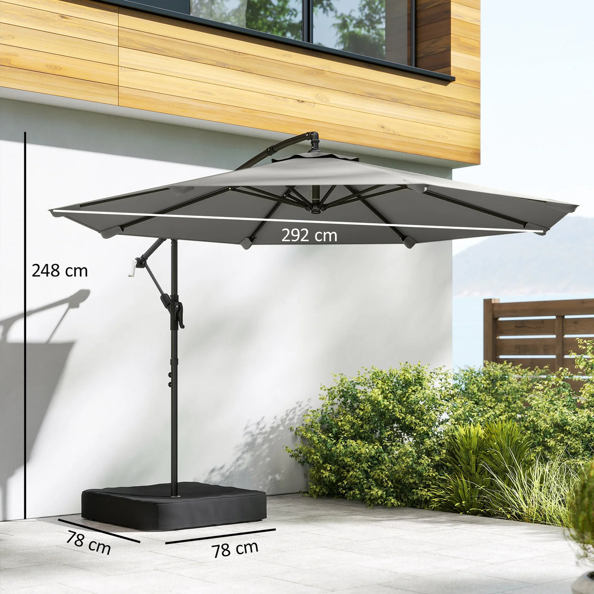 Grey cantilever patio parasol with adjustable canopy and black cross base