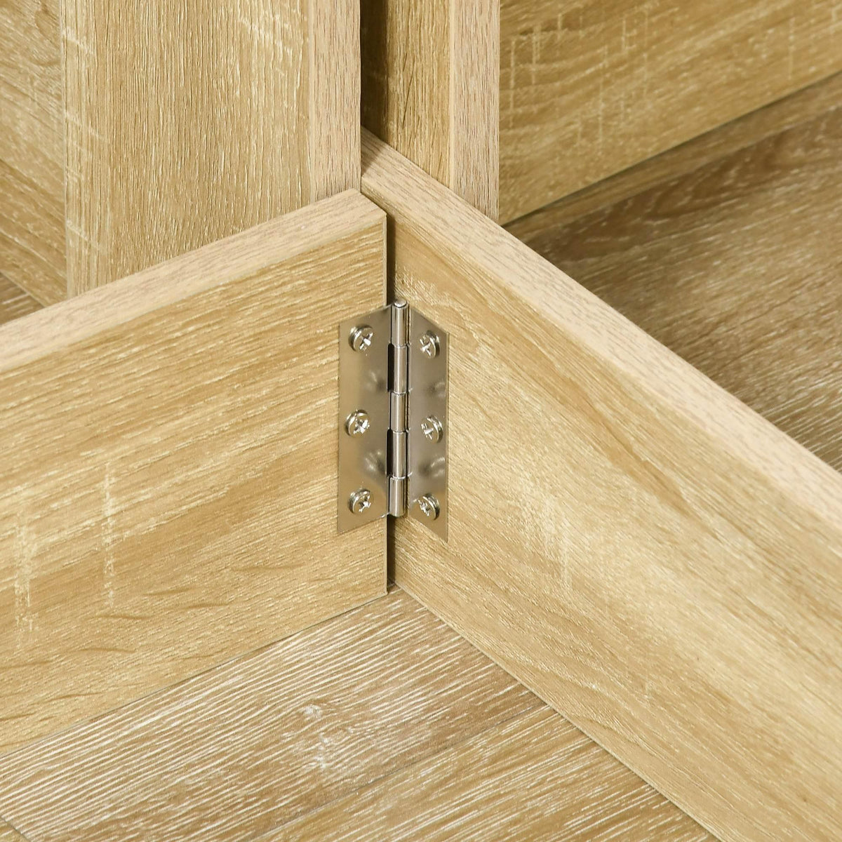 Oak drop-leaf table hinge hardware with metal pins on tabletop support