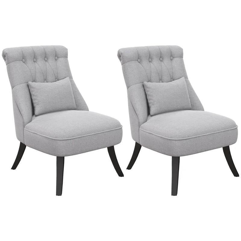 Set of 2 grey upholstered single tub chairs with tufted back, armrest cushion, and wood legs.