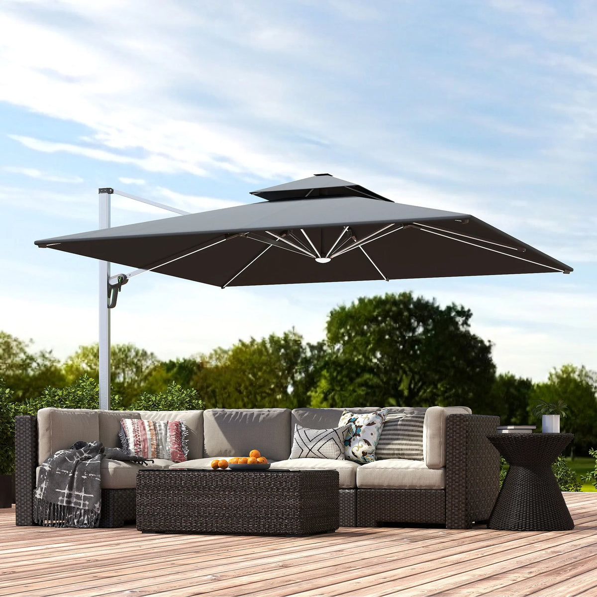 Grey cantilever garden umbrella with open canopy and central pole stand