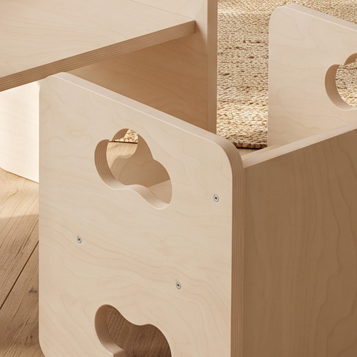 Light wood toddler chair side with rounded handle cutout and bear-shaped silhouette