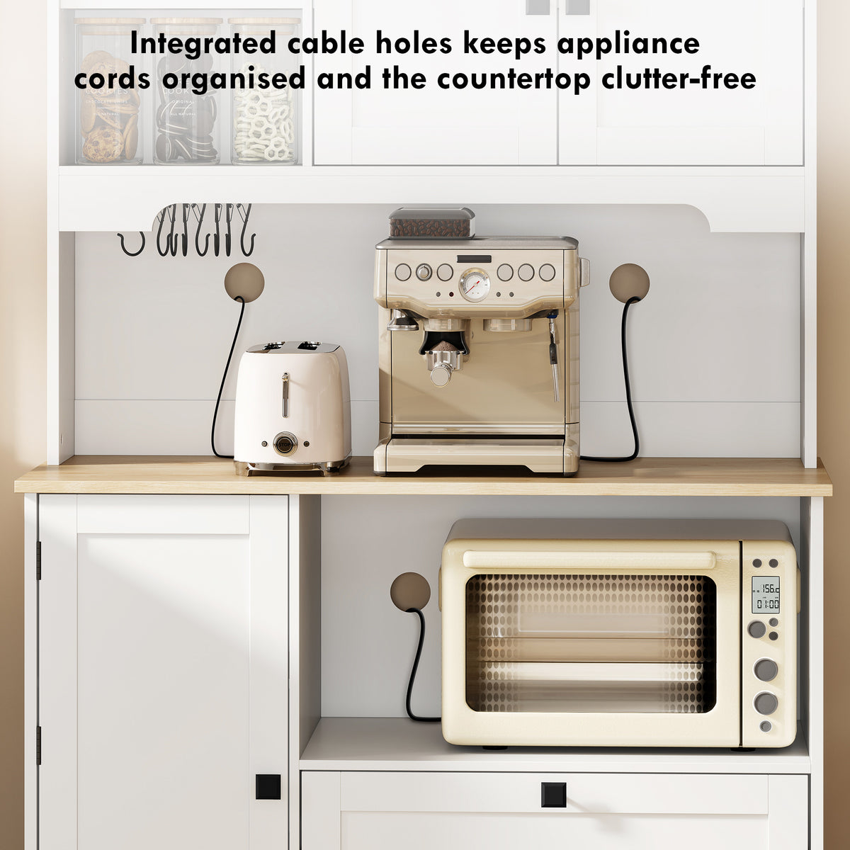 White kitchen cabinet with built-in hooks, cable holes, and appliance-ready countertop