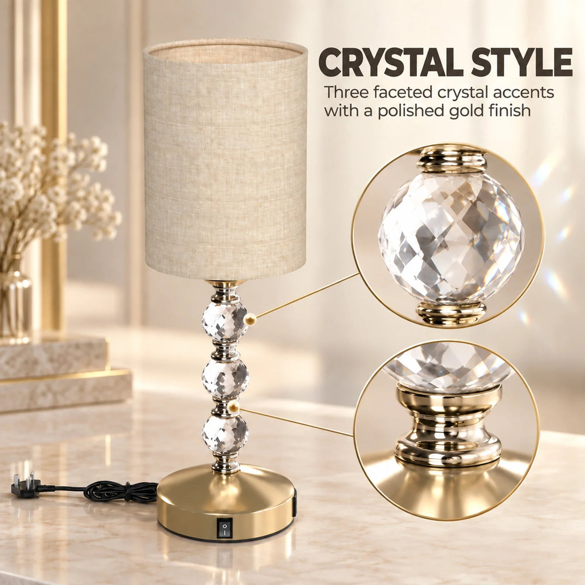 Crystal table lamp with beige shade, polished gold accents, and faceted crystal details