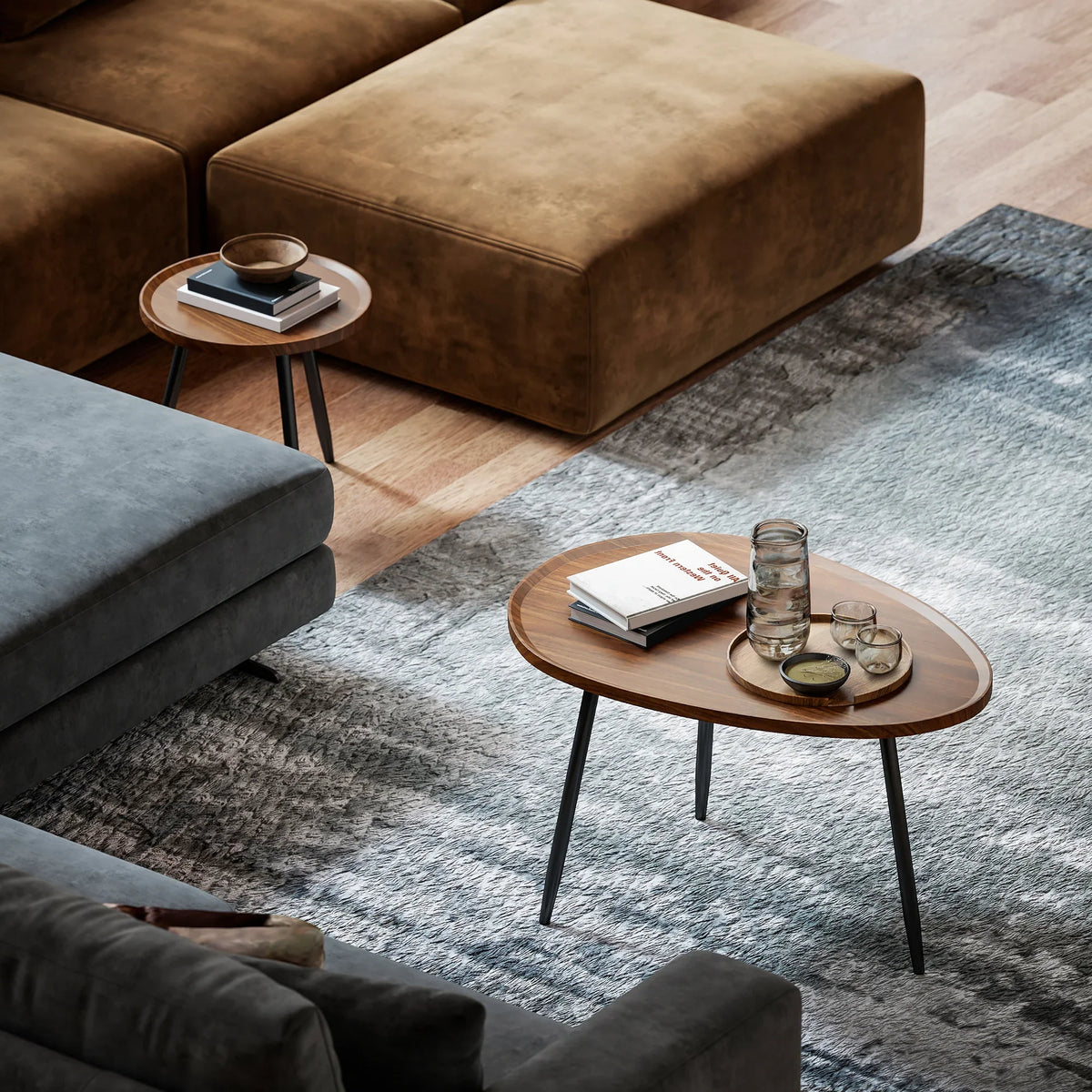 Chestnut wood-effect round coffee tables with black metal legs for living room seating