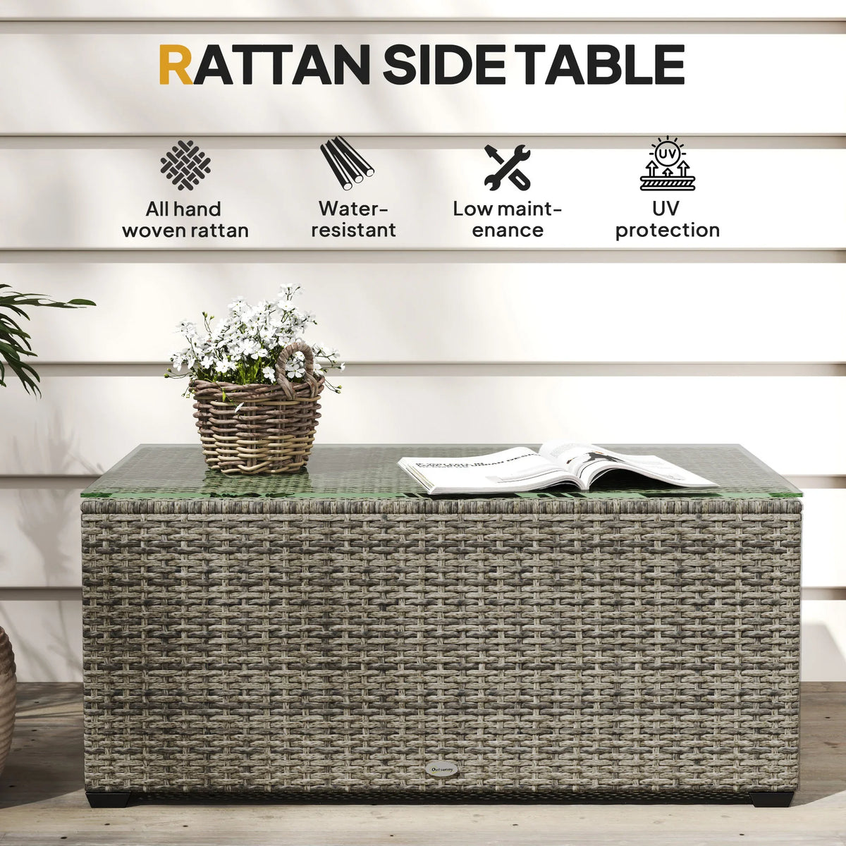 Dark grey rattan side table with clear tempered glass top, woven storage body