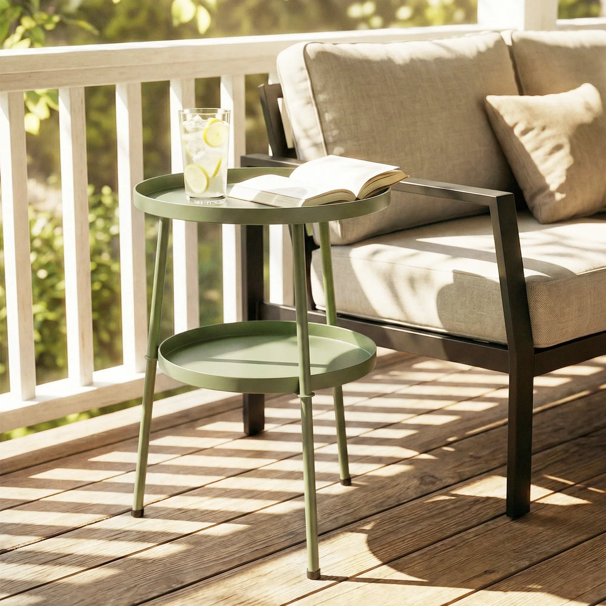 Light green 2-tier round patio side table with top tray and circular lower tray