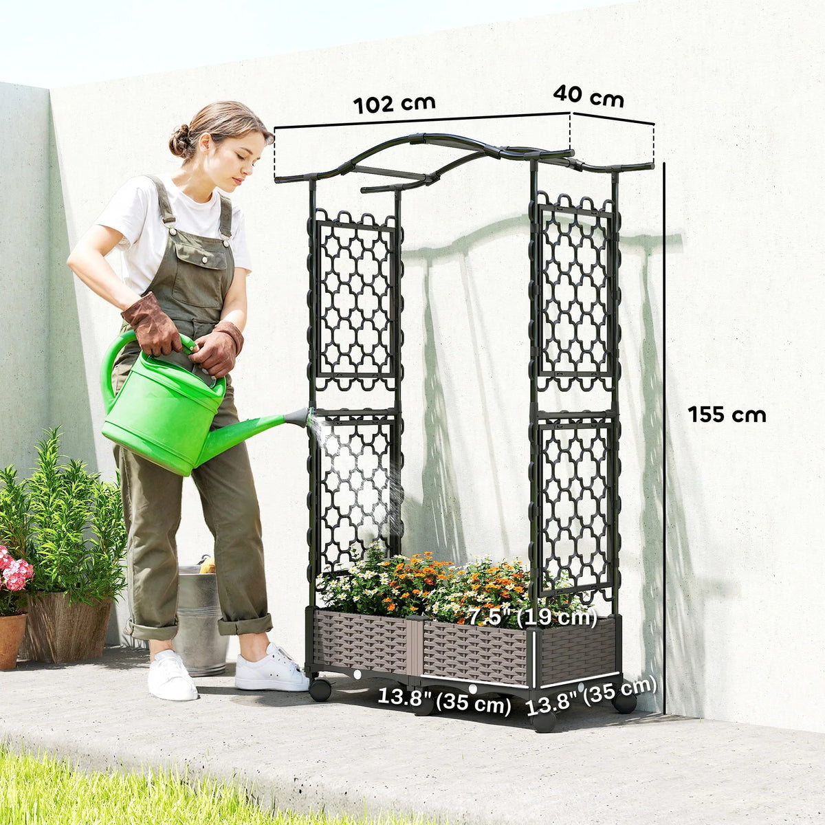 Self-watering raised garden bed with arch trellis and dark woven planter, shown with wheels and front side panels