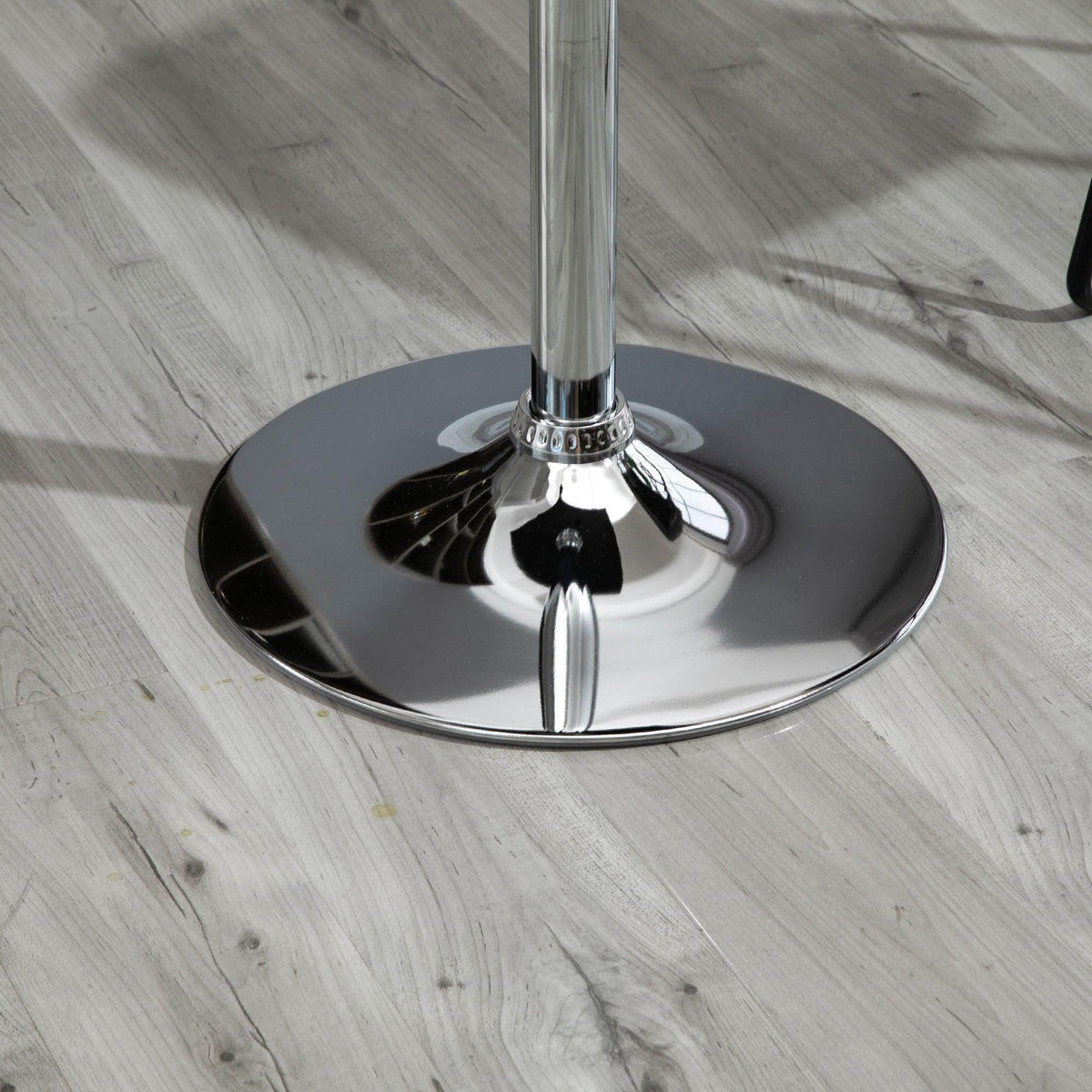 Chrome round base with center pedestal for an adjustable swivel bar table