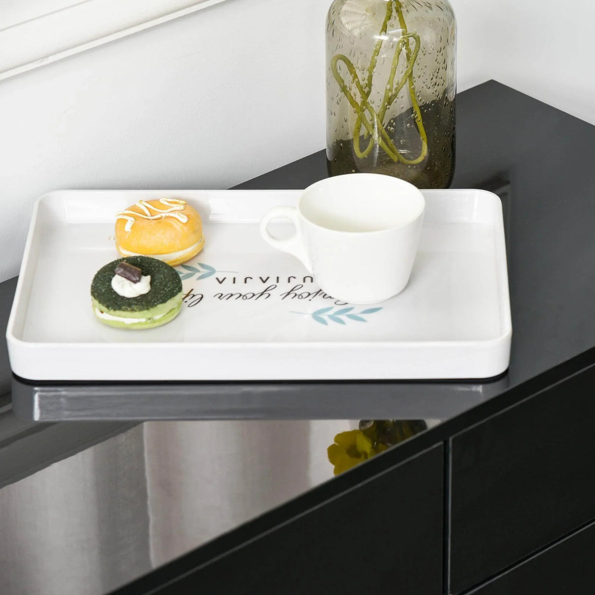 Black high-gloss sideboard with open top drawer and inner shelf tray.