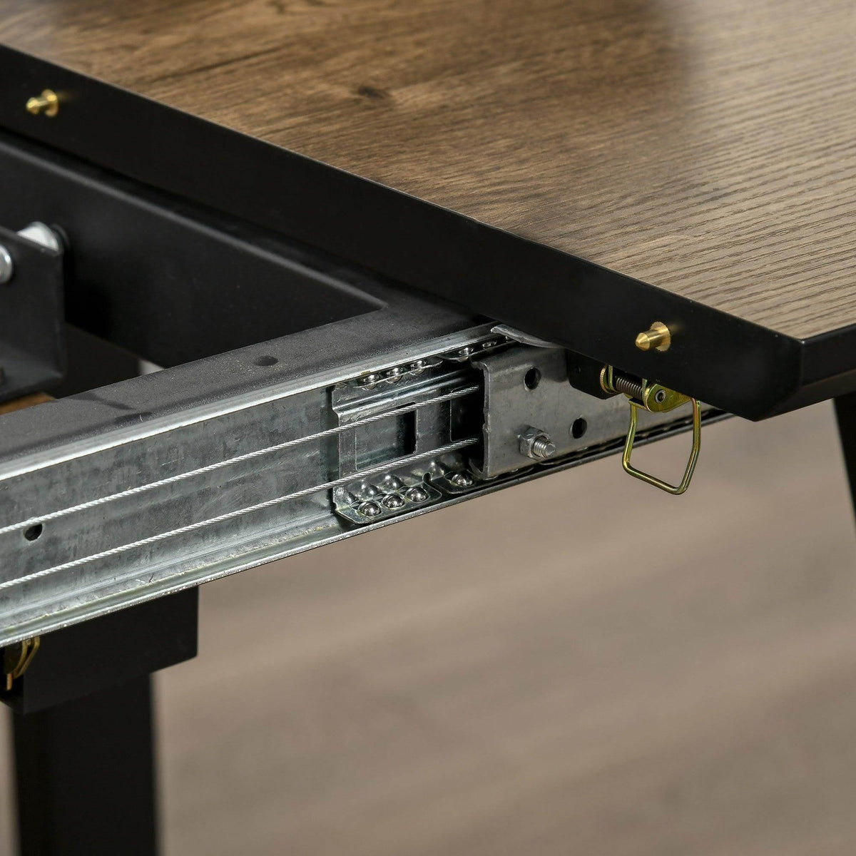Extendable dining table extension mechanism with steel rails and black underside