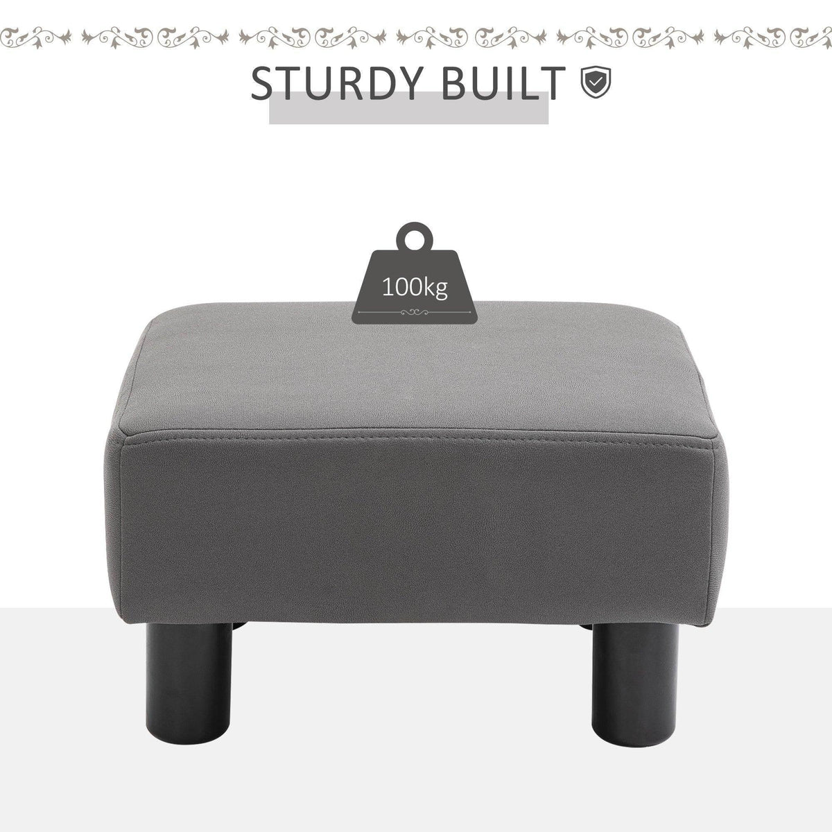 Grey upholstered foot rest ottoman with stitched top and four thick black legs