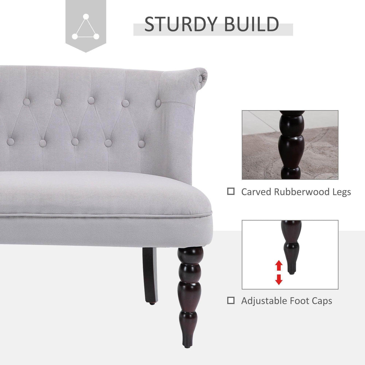 Light gray loveseat showing button-tufted back and carved wooden legs with caps