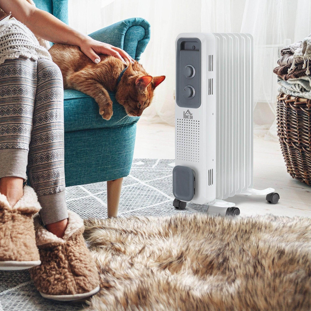 White portable electric space heater with vertical fins and gray control panel