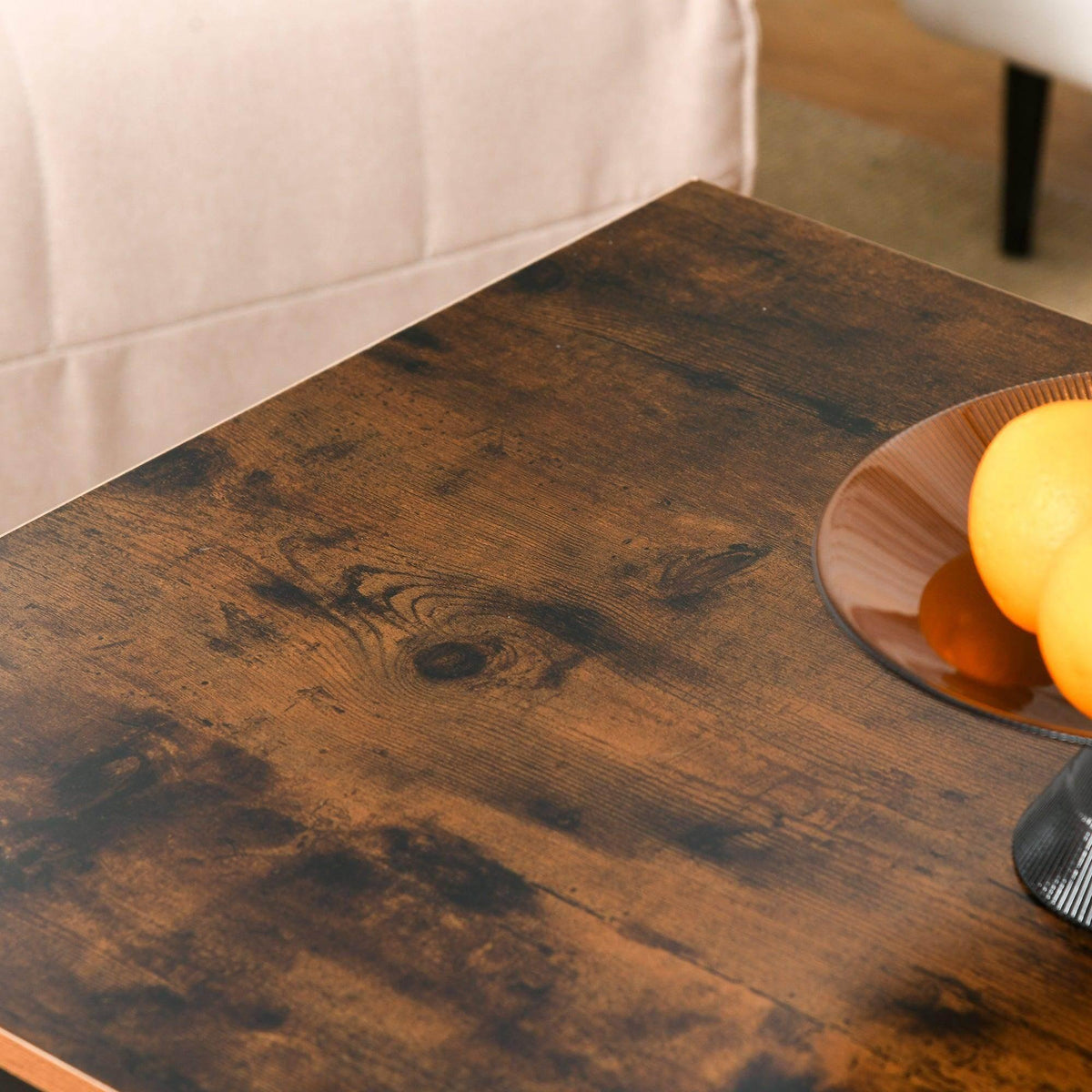 Rustic brown coffee table top with visible wood grain and orange trim edge