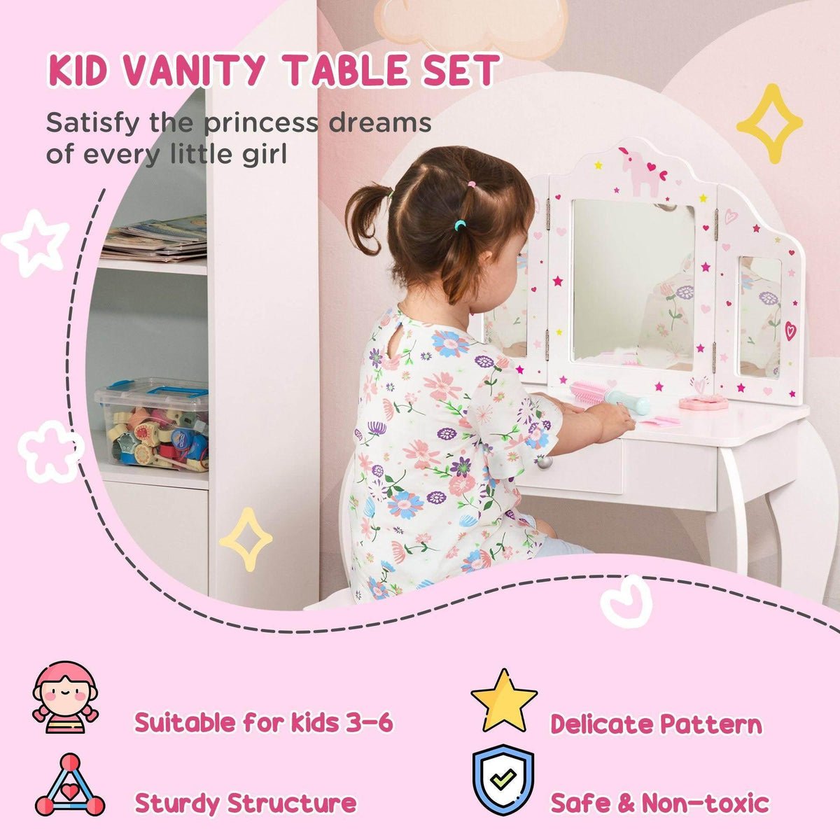Kids vanity table set with rotating mirrors and star-and-heart decals, child using