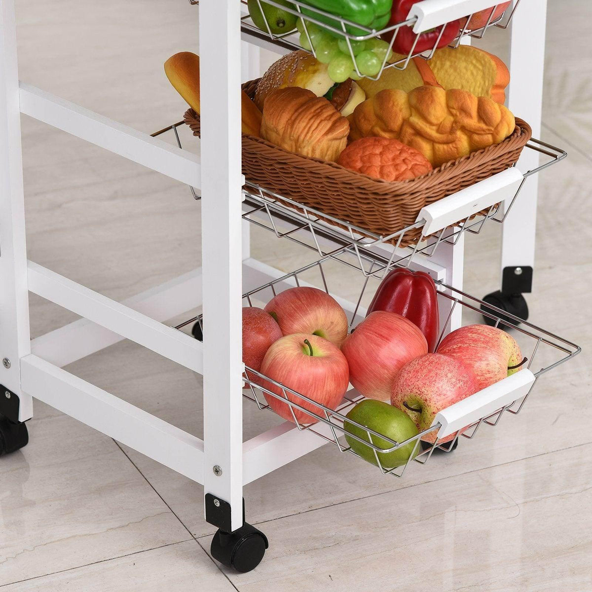 Kitchen trolley with front lower wire baskets holding fruit and vegetables, white rolling frame