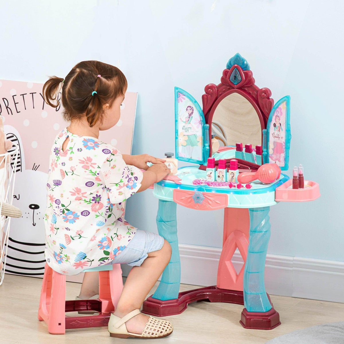 Kids dressing table set with mirror, stool, and makeup play accessories in pink and teal