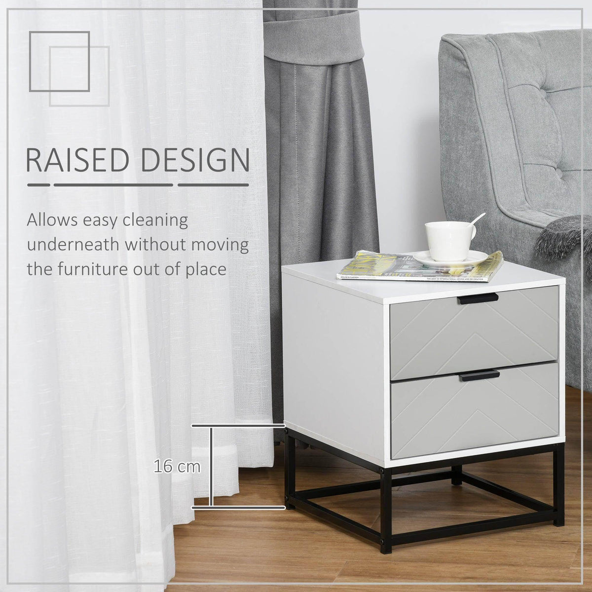 White bedside cabinet with 2 drawers on a black metal base beside a bed