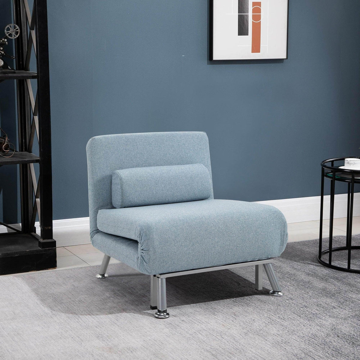 Blue sofa bed with fold-down backrest, padded seat, and metal legs.