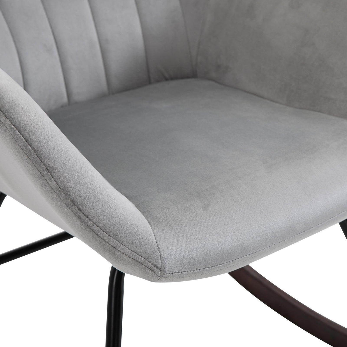 Grey cushioned rocking chair seat with thick padding and black support legs.