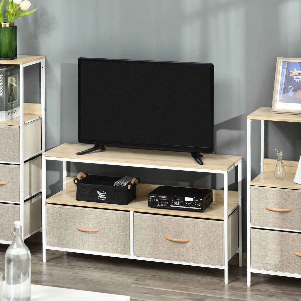 TV stand with open shelf, two drawers, light wood top, gray fabric storage bins