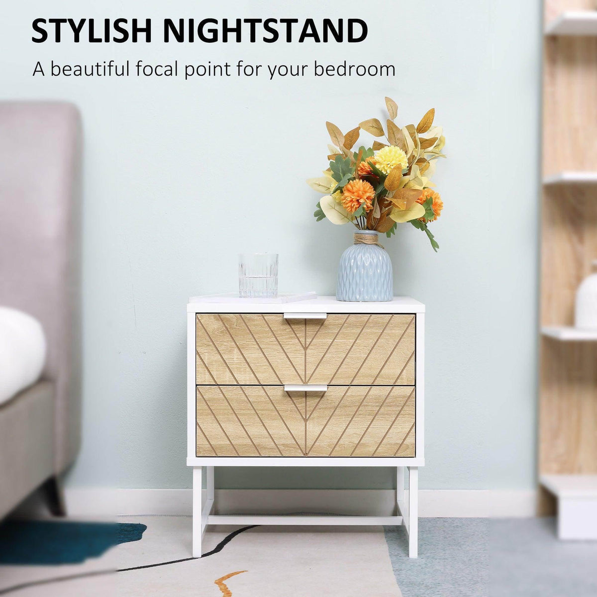 White bedside table with two drawers and gold-toned chevron-pattern drawer fronts