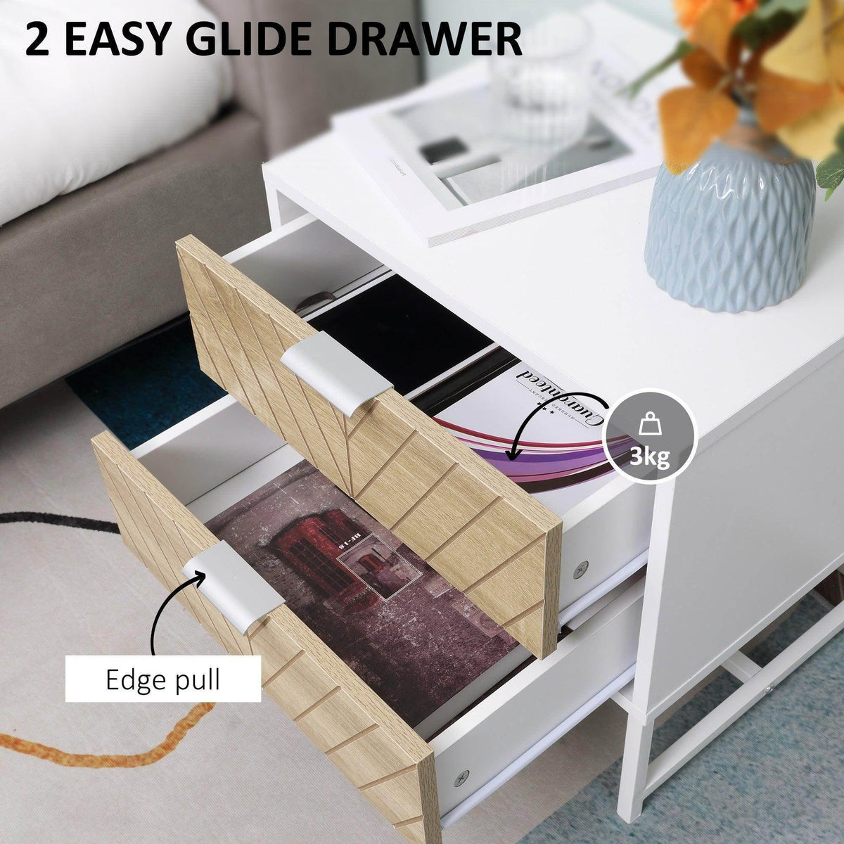 White bedside table with two gliding drawers open, gold-toned chevron-pattern drawer fronts