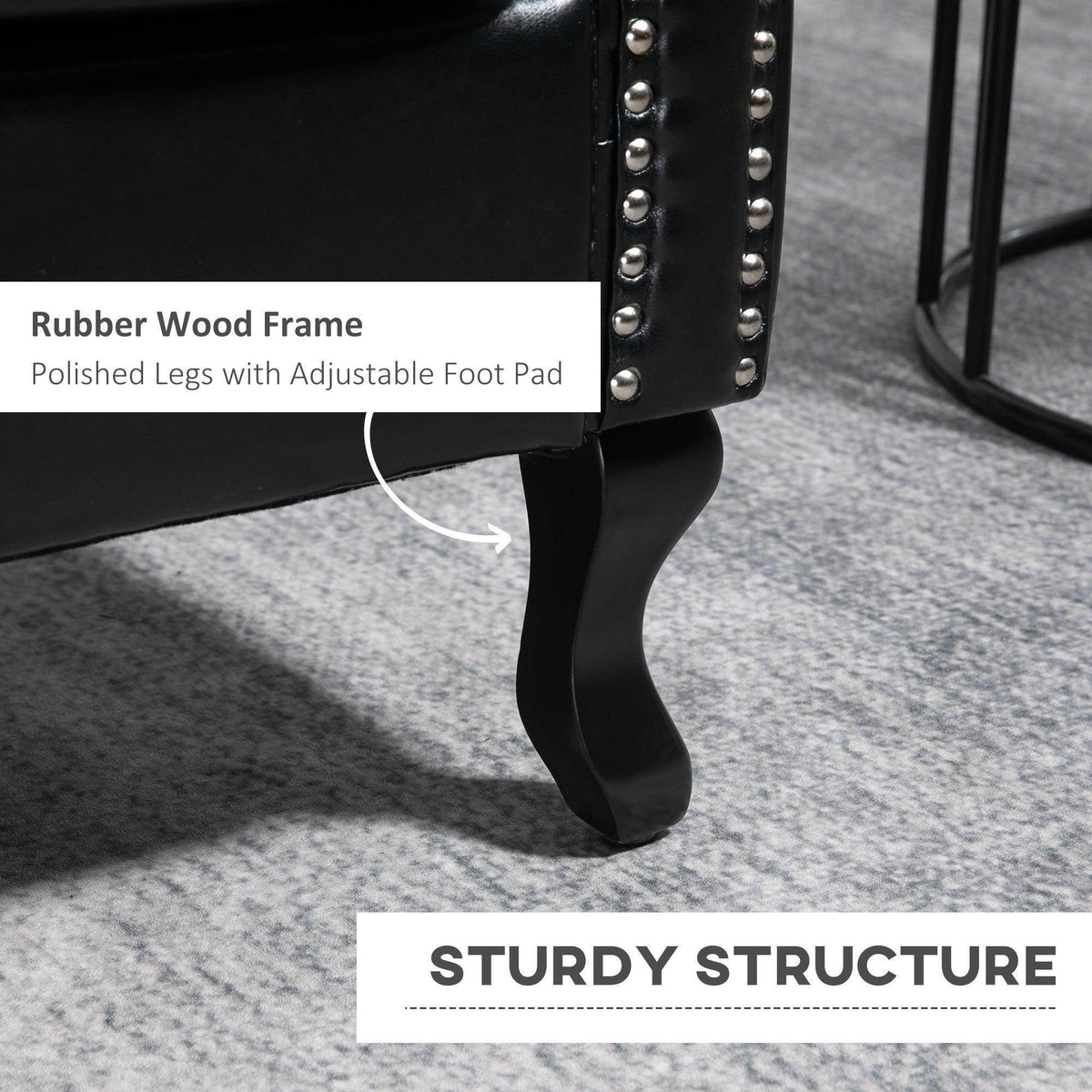 Black wingback armchair legs with studded side trim and padded seat base