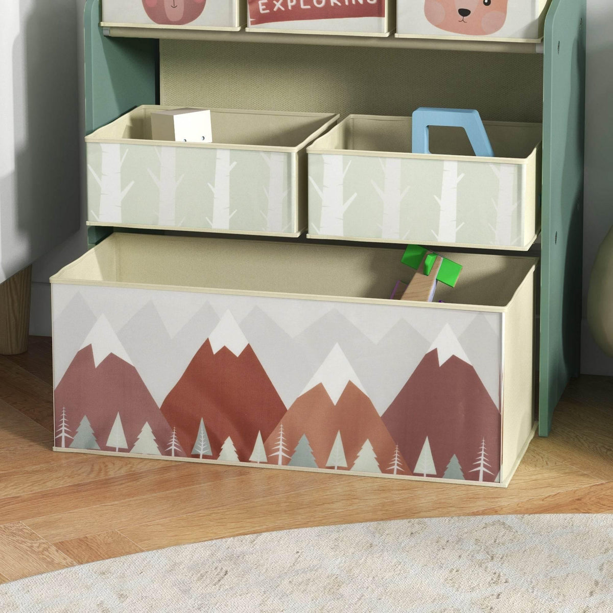 Close-up of green lower storage shelf with open bins for toys or books