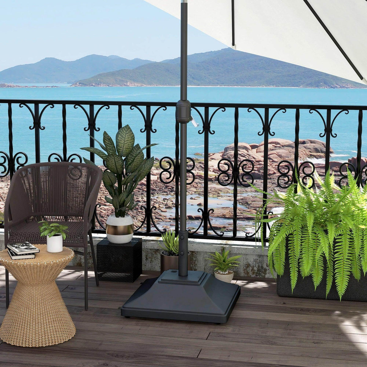 Black square parasol base with center pole and wheels on outdoor patio deck.