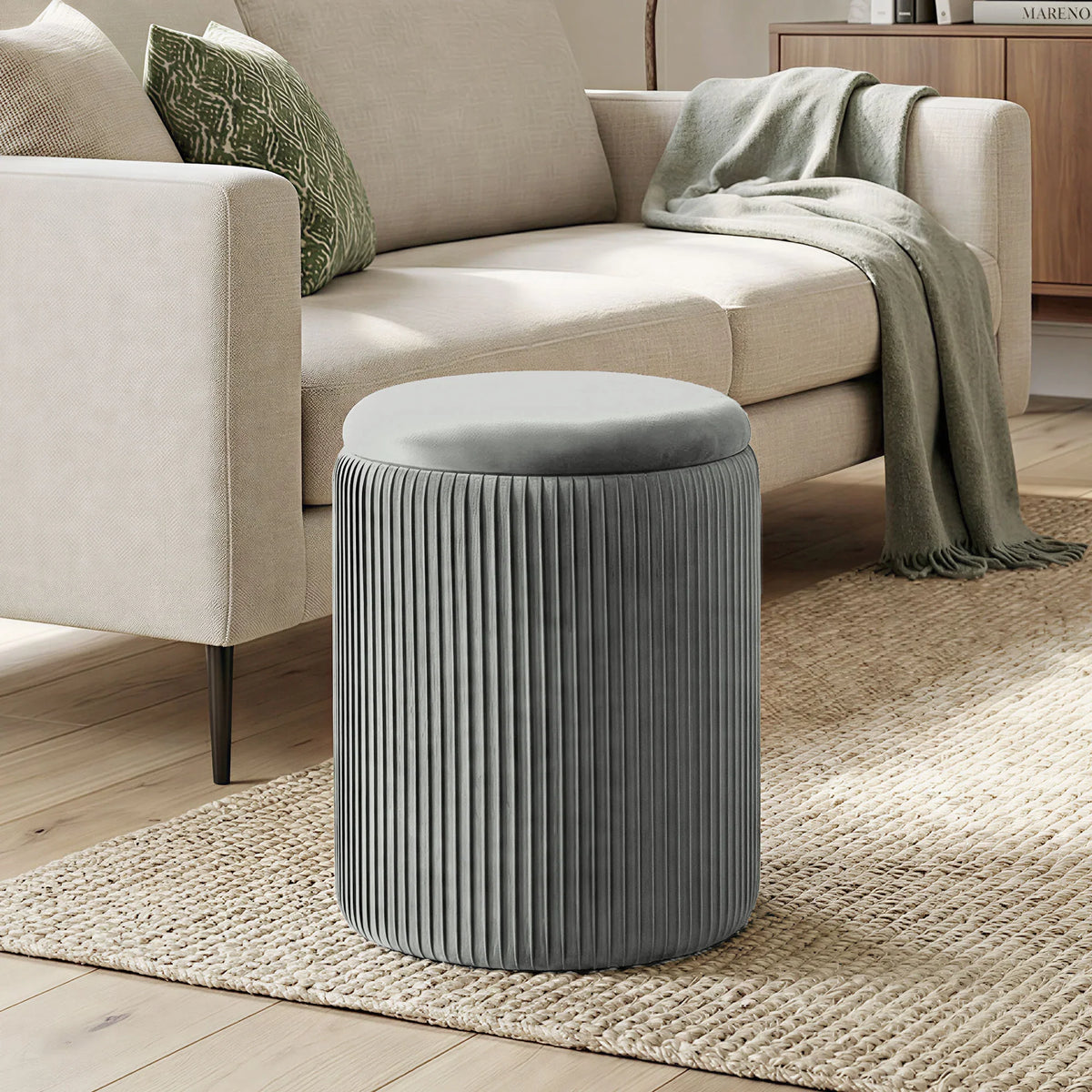 Grey ribbed velvet round storage ottoman footstool with padded top and open lid