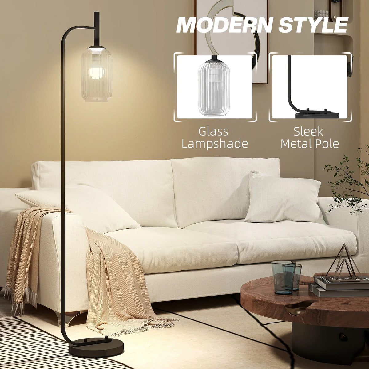 Black floor lamp with clear glass lampshade and sleek metal pole, modern style