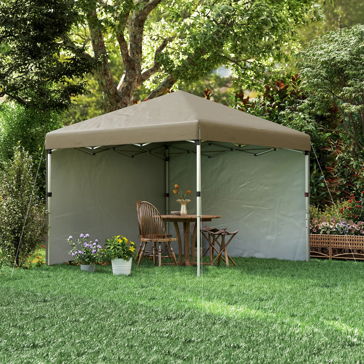 Khaki pop-up gazebo with two sidewalls, open doorway and outdoor dining setup