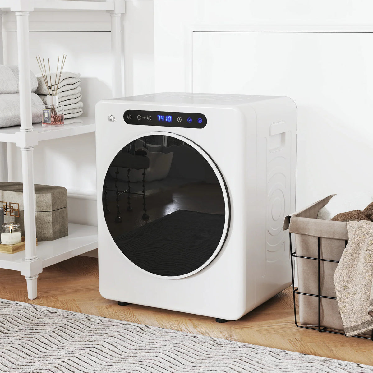 White compact tumble dryer with circular door and digital control panel