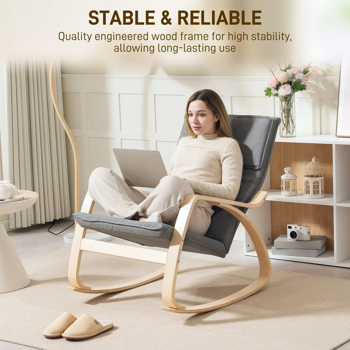 Grey upholstered rocking lounge chair with headrest and light wood rocking base