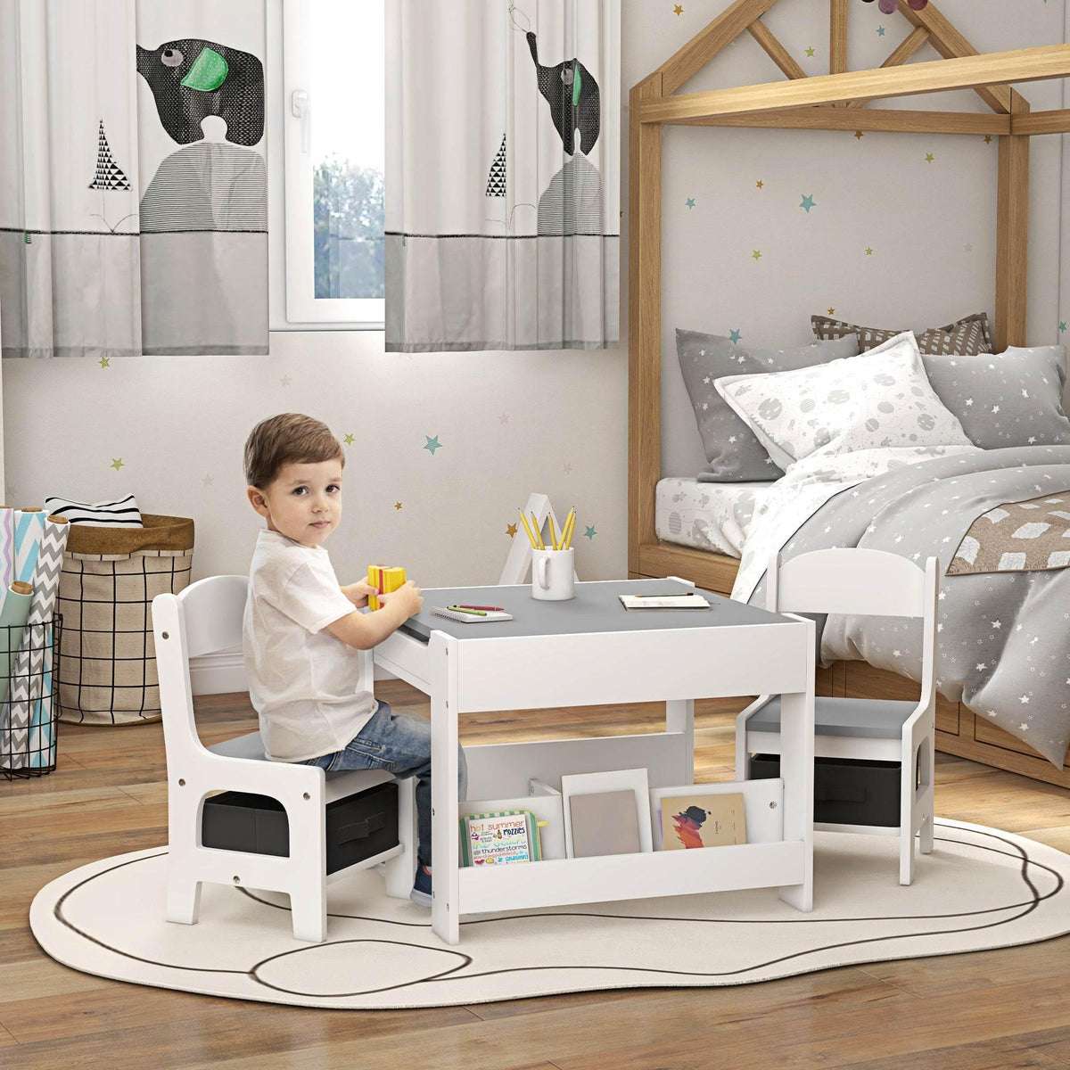 Kids white table and two chairs set with chalkboard top and storage cubbies