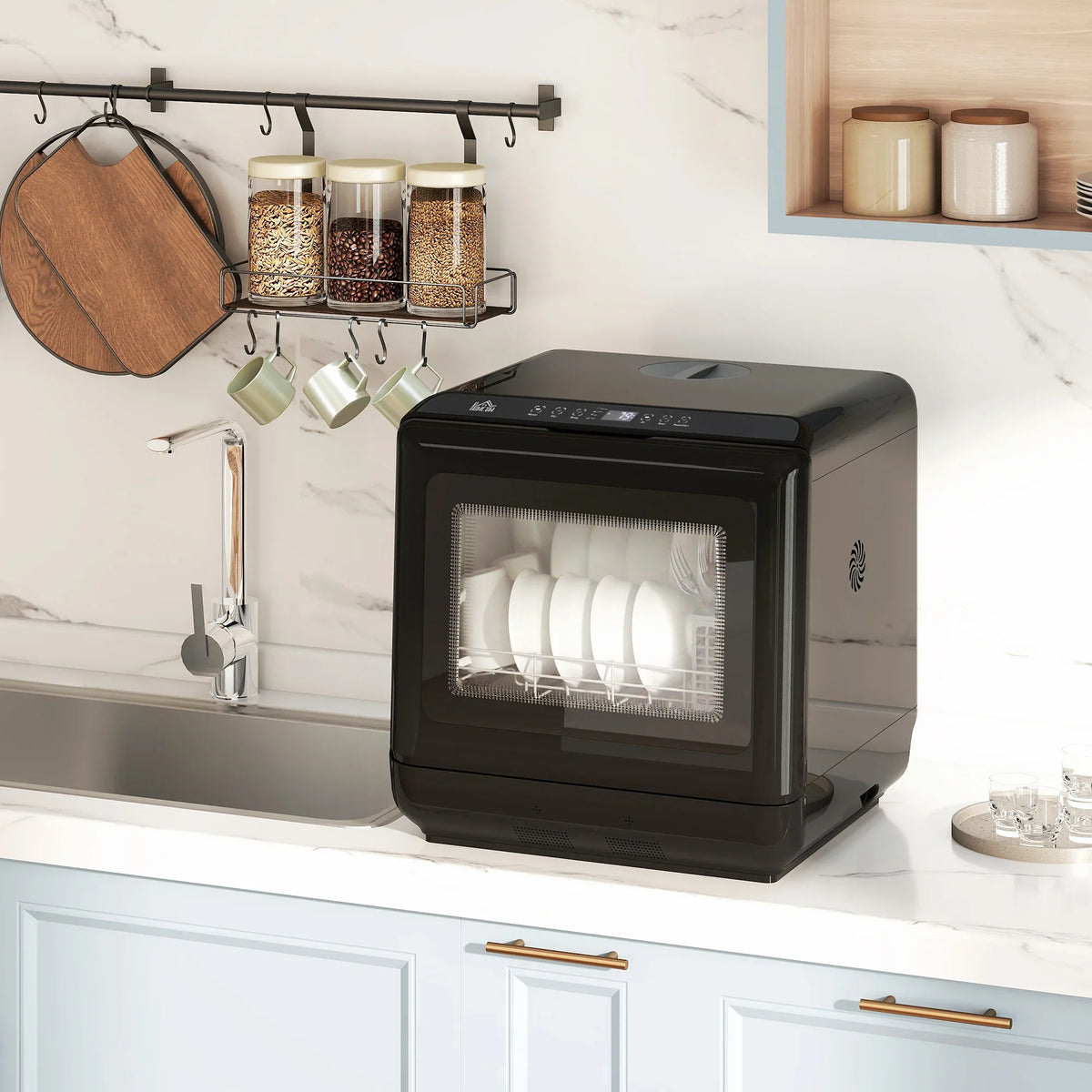 Black countertop dishwasher with open door and white dishes on rack