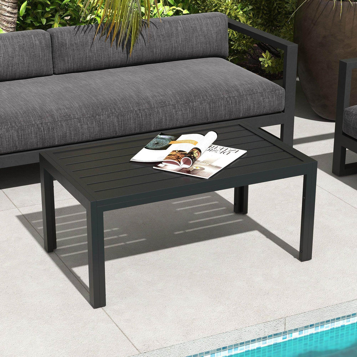 Black rectangular patio coffee side table with slat tabletop and steel frame