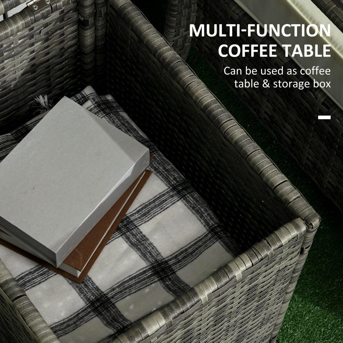 Grey wicker storage coffee table with hinged lid and removable cushion on top